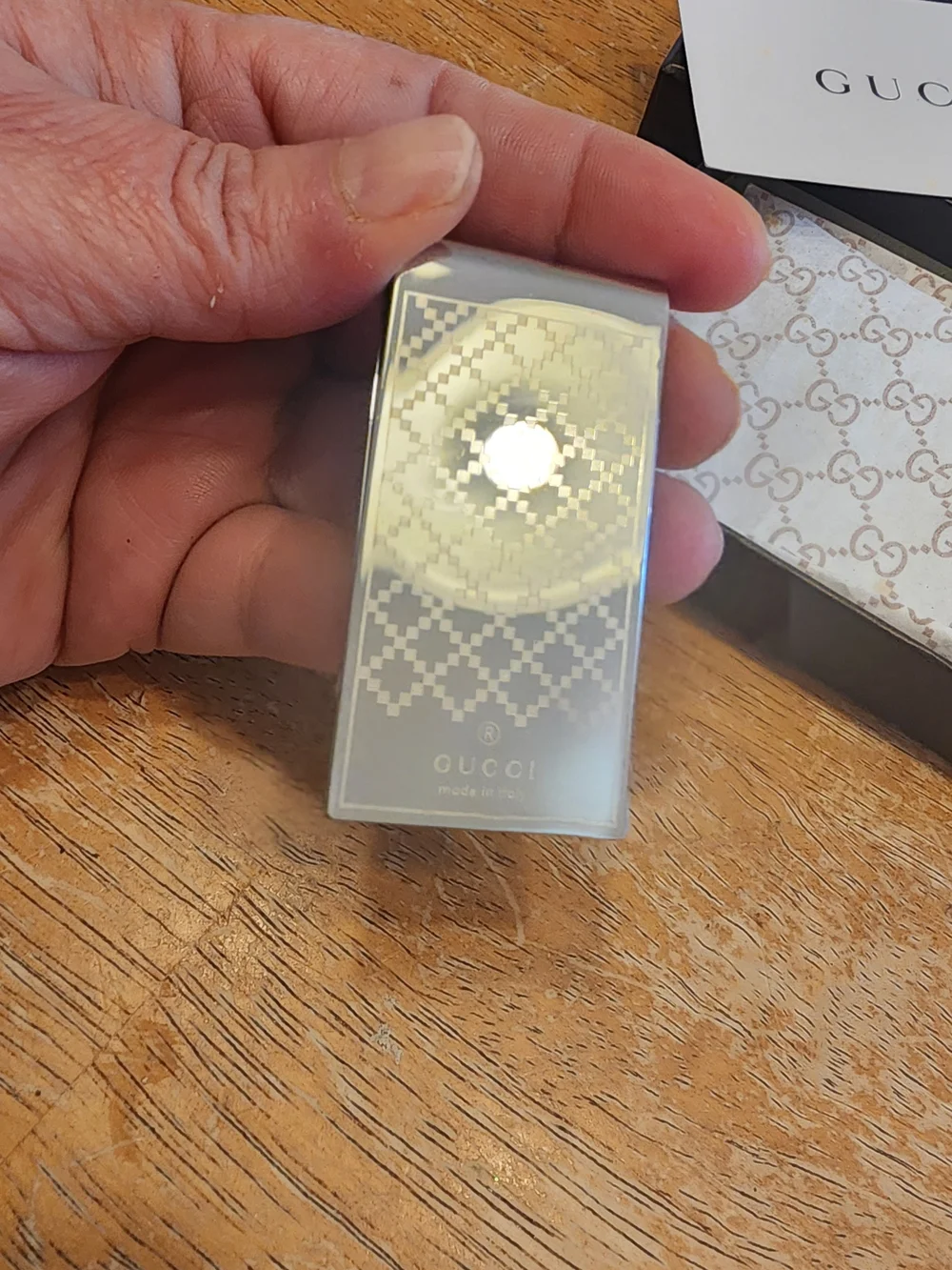 Gucci Diamante money clip featuring the signature diamond pattern and engraved